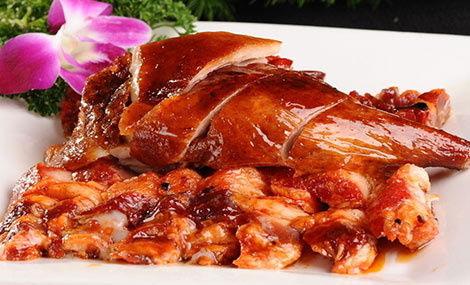 中国的特产有烤鸭英语 烤鸭是北京著名的食物英语
